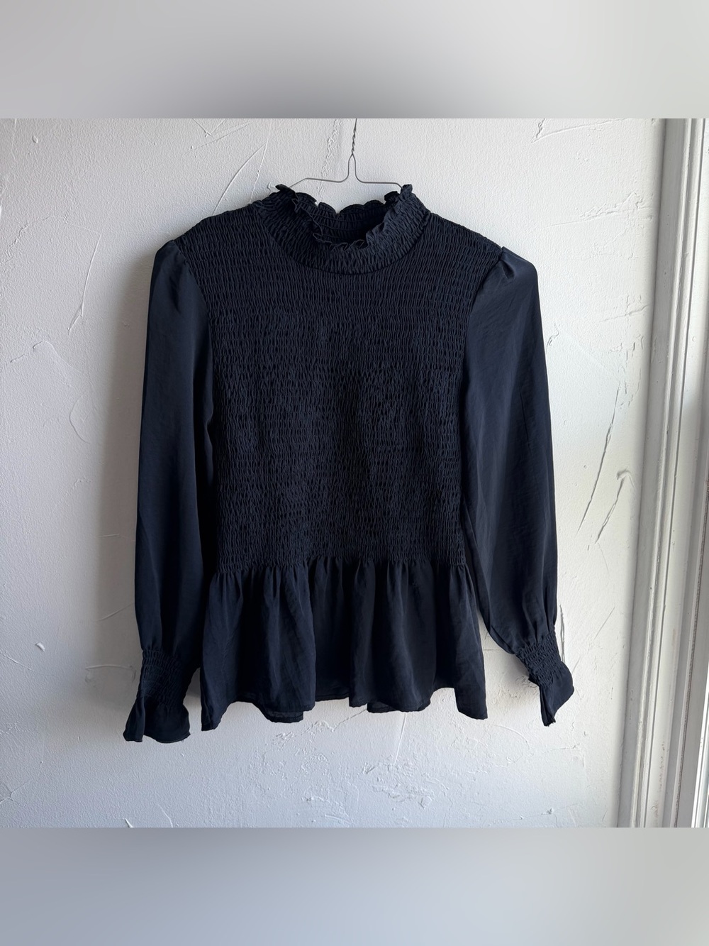 Flawless long-sleeve peplum smocked blouse